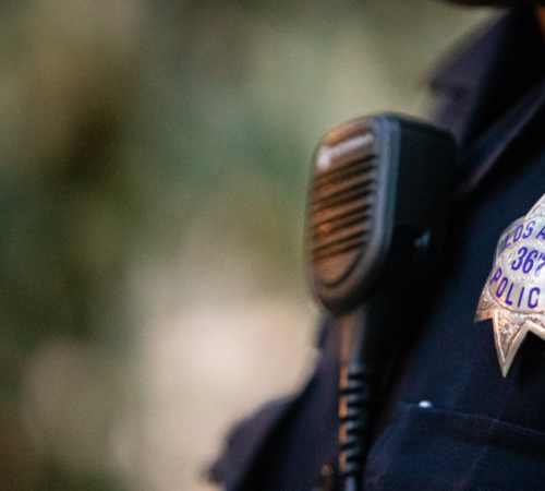Police Officer's Badge and Radio