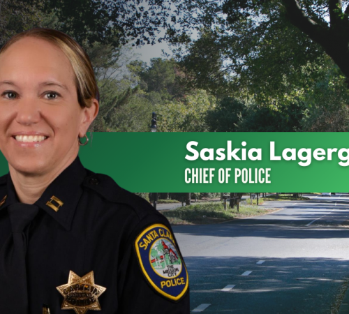 Saskia Lagergren Chief of Police Woman in police uniform behind her a street filled with trees