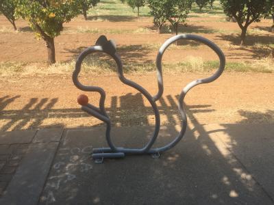 Artistic Bike Rack in the shape of a squirrel 